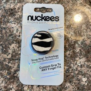 Nuckees phone grip and stand